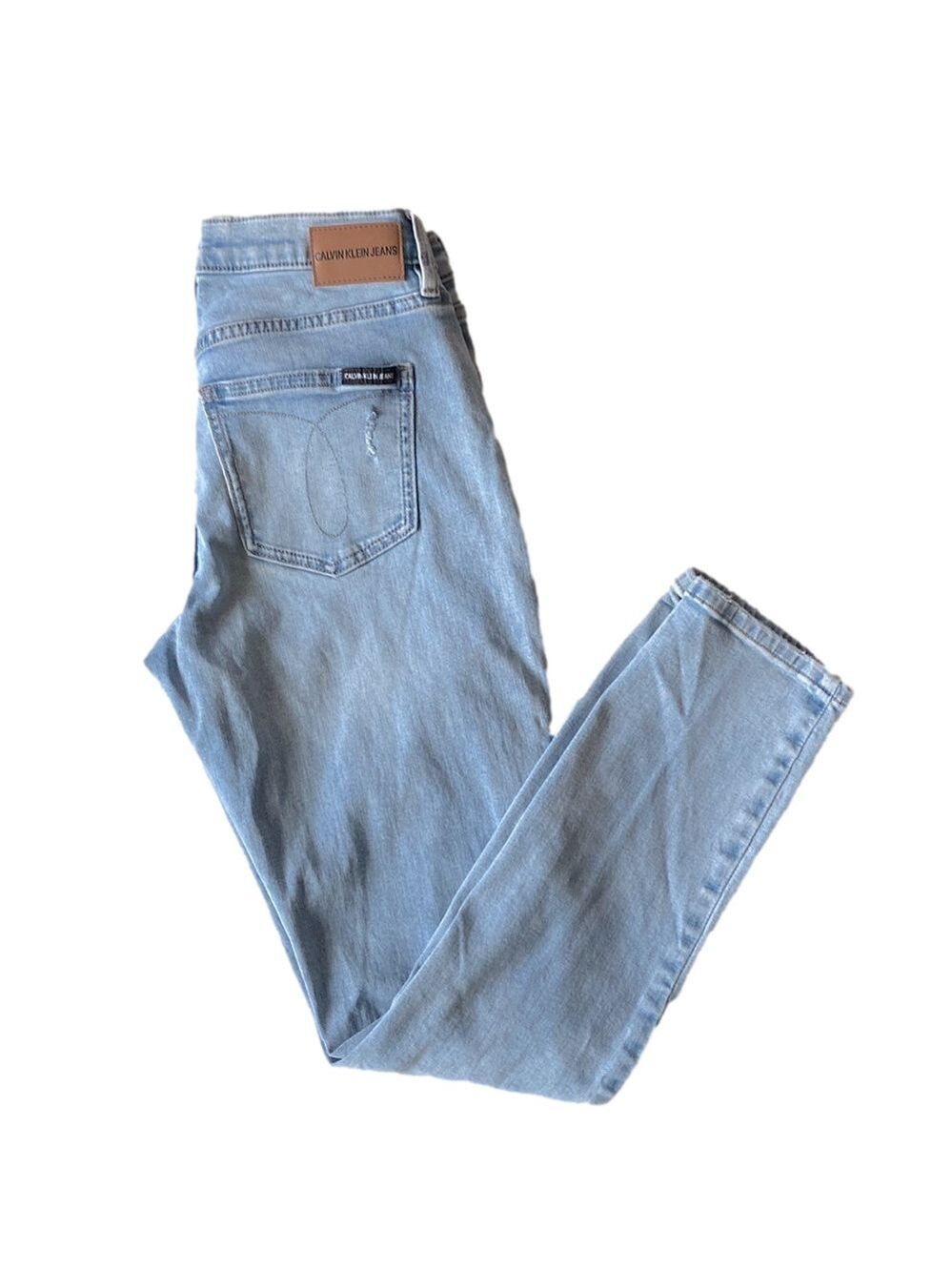 Calvin Klein faded ripped jeans. 25